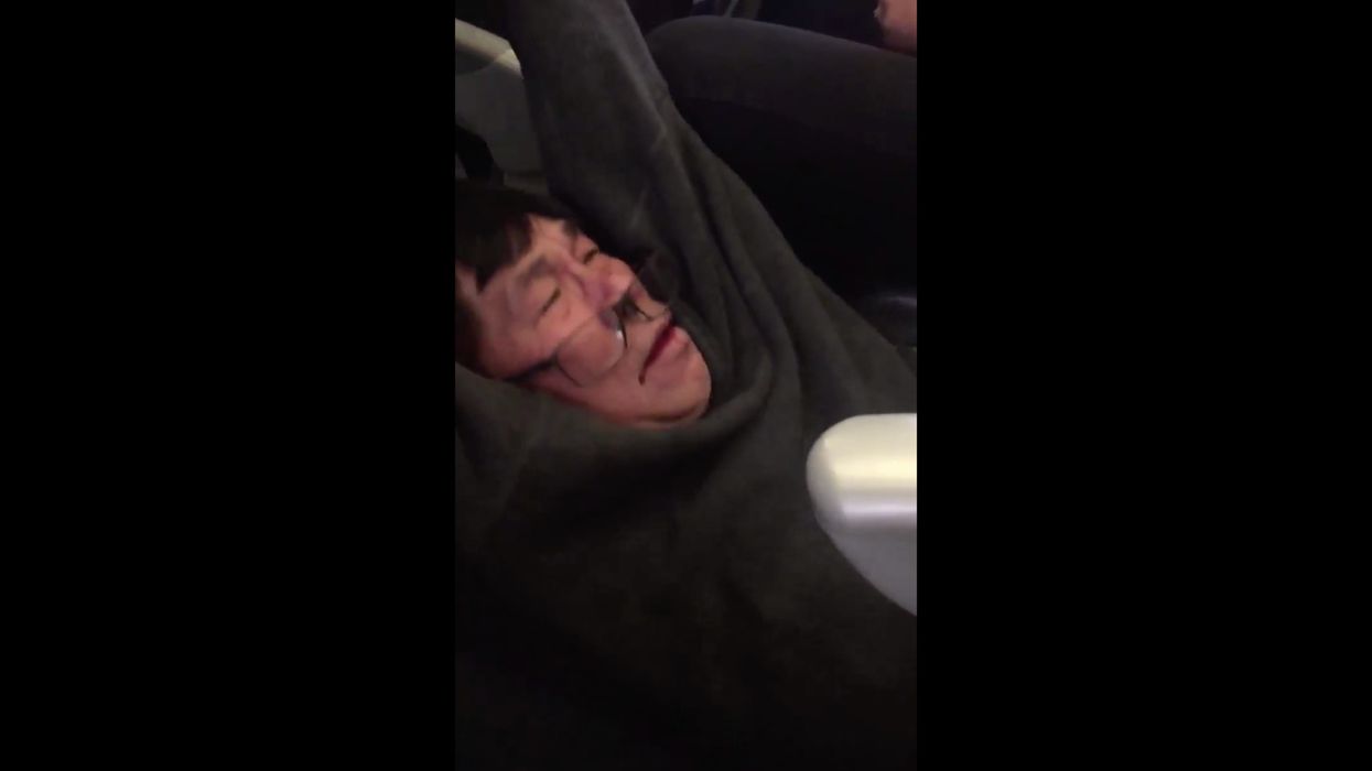 Doctor who was bruised and bloodied after being dragged off a United flight breaks his silence on the disturbing event 2 years later