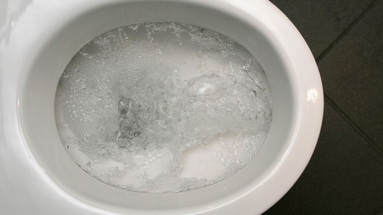 Activist shares bizarre, disturbing bathroom photo to show men can get periods. Internet shuts activist down fast.