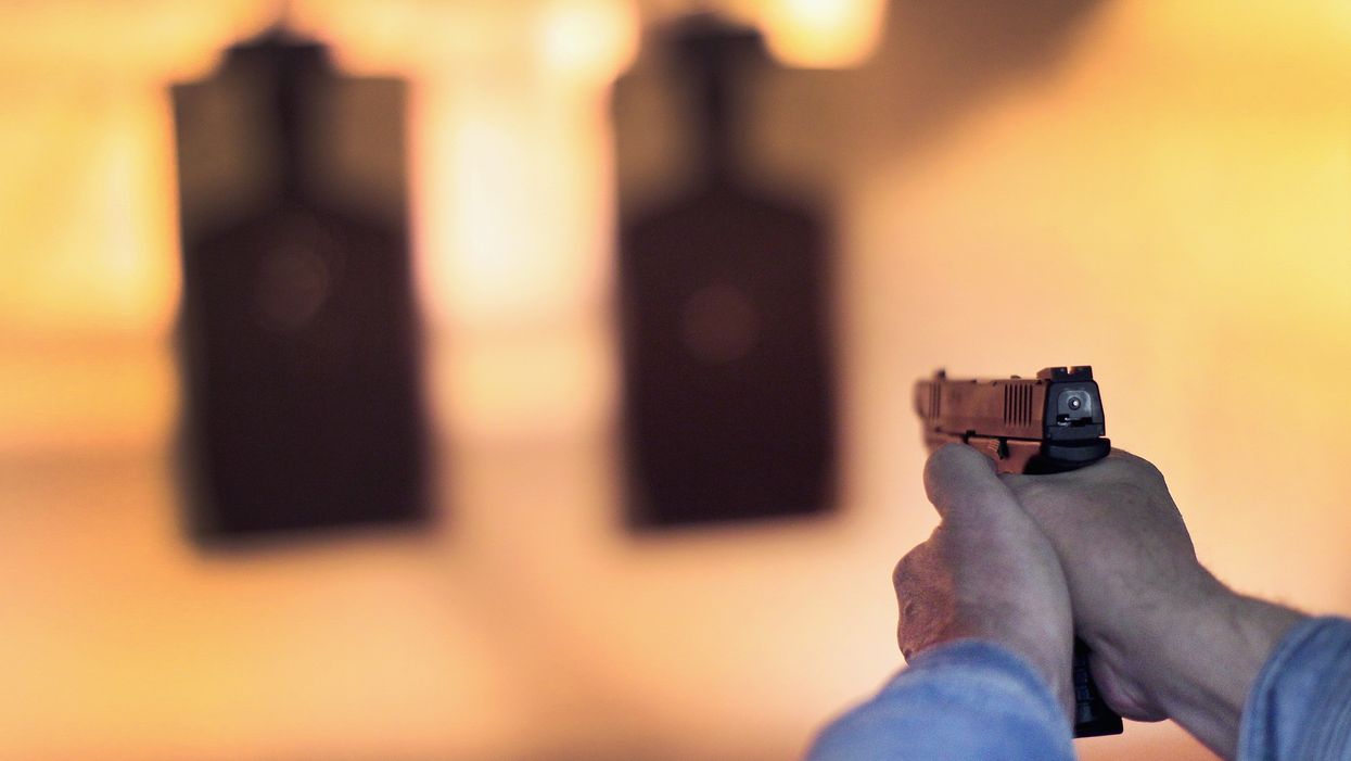 School suspends 2 students for sharing photos at gun range. Now the ACLU is helping the students sue the school.