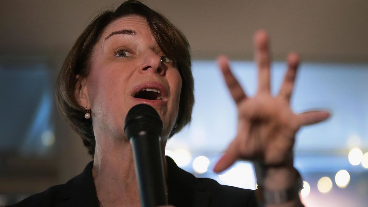 Democratic presidential candidate Amy Klobuchar has an embarrassing 'please clap' moment at CNN town hall