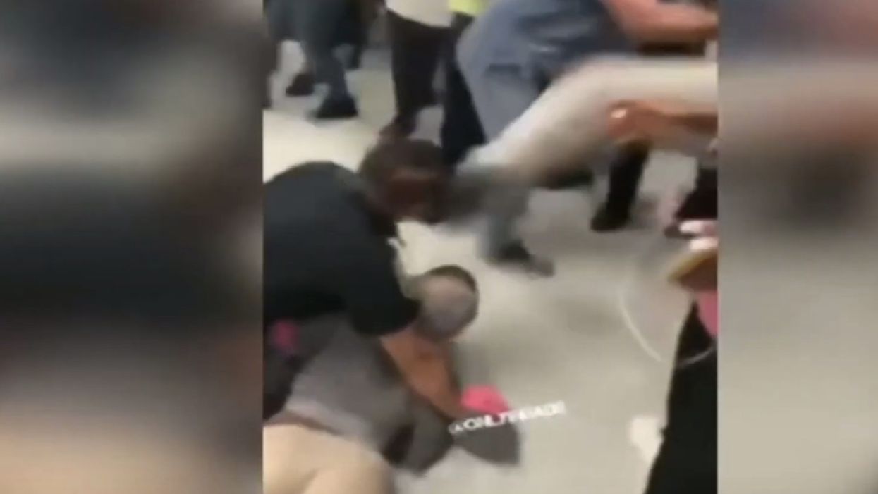 WATCH: Female HS student kicks police officer in head during lunchtime brawl. The deed doesn't go unpunished.