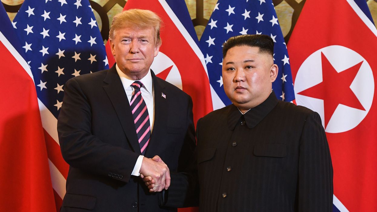 North Korea launches 'projectiles', Trump Tweets Kim 'knows that I am with him'