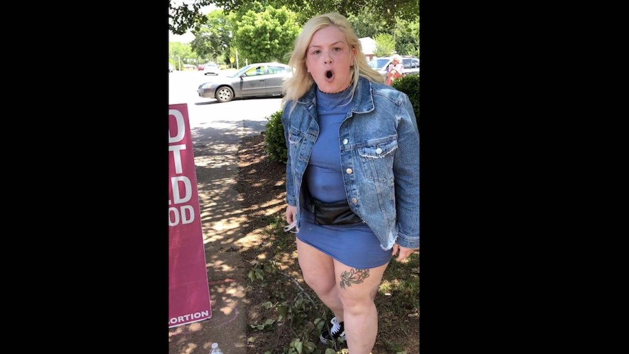 Woman flips out at pro-life activists outside abortion clinic, leaves car and allegedly punches one of them recording tirade
