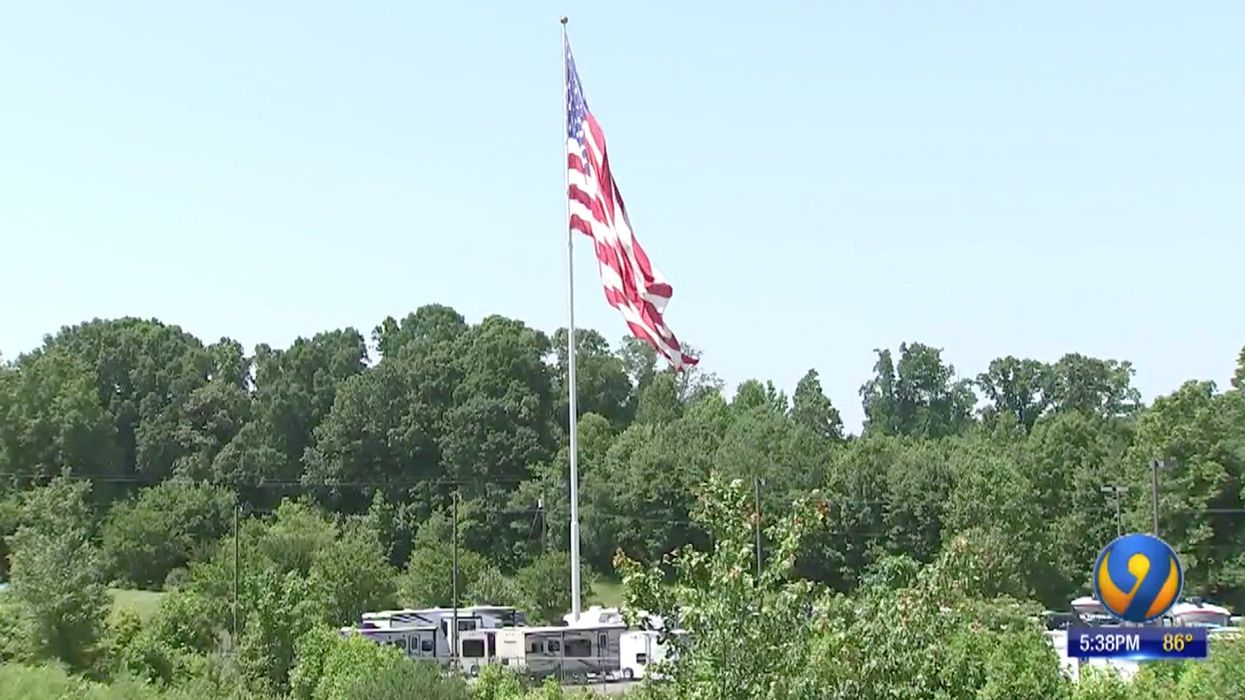 Camping World CEO won't remove massive American flag that flies above his North Carolina RV store despite city's lawsuit and fines