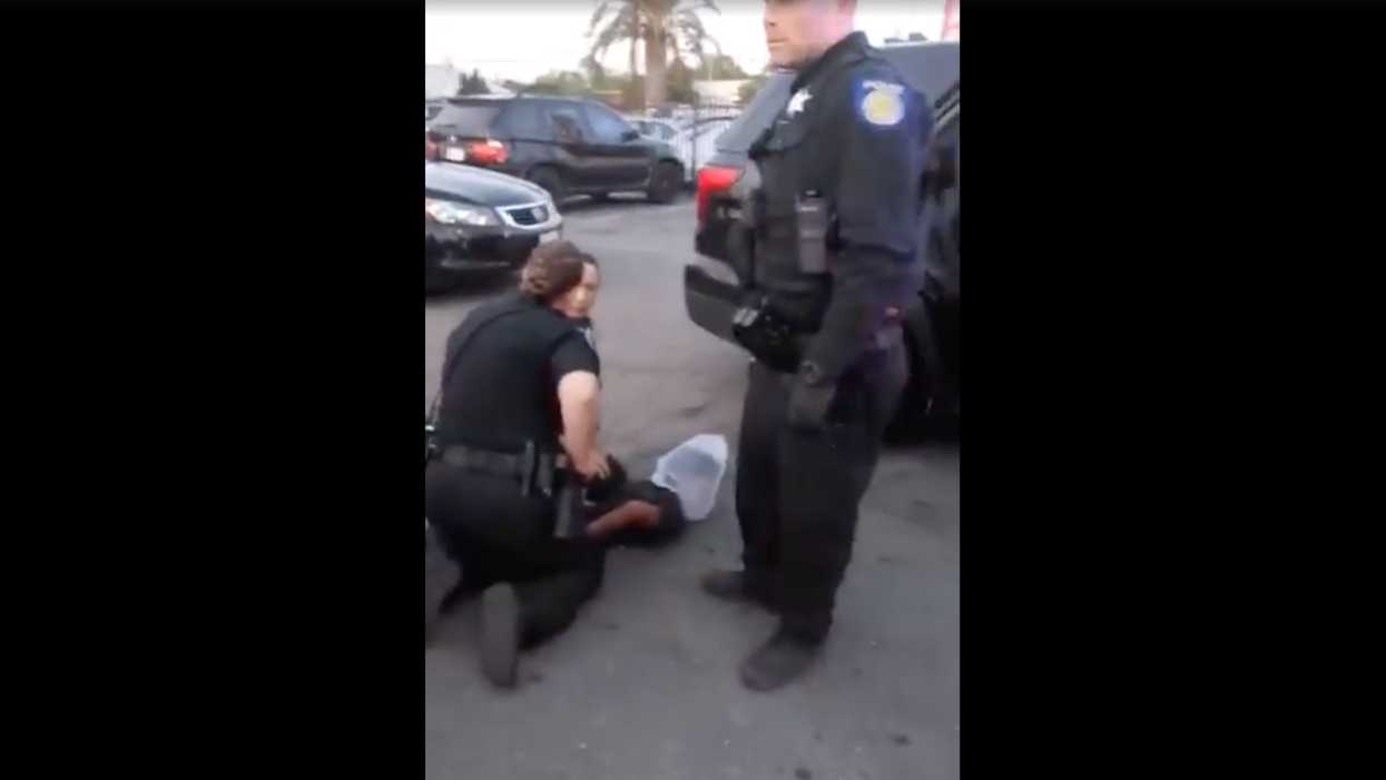 Viral video shows officers using spit hood on unruly 12-year-old. Now his family wants an apology from police.