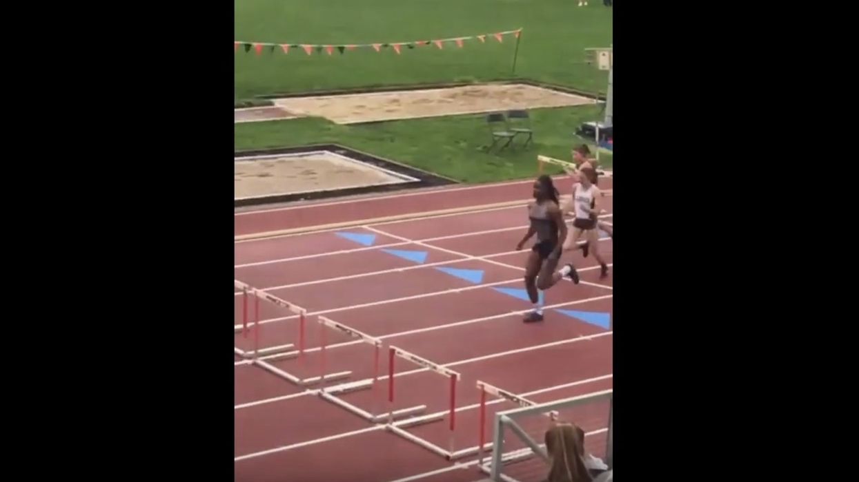 Hurdler born male but competing as female easily takes NCAA women's national championship