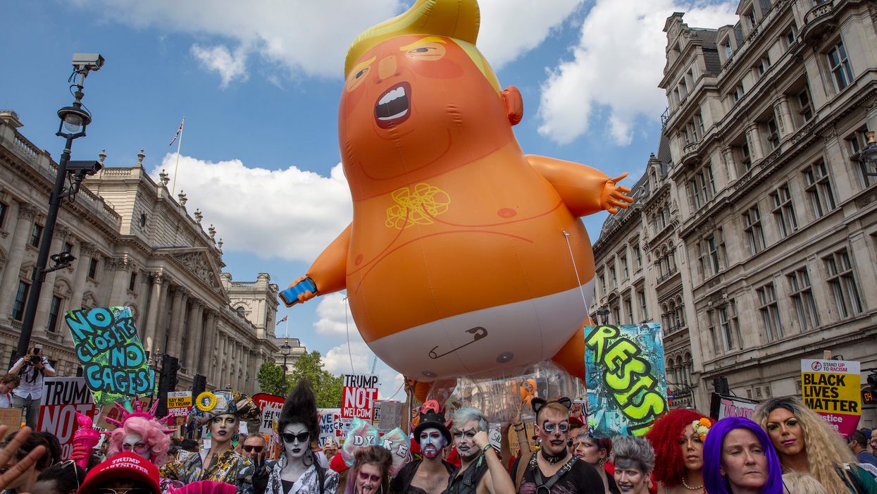 Woman stabs 'Baby Trump' blimp in the back during London protest, gets arrested