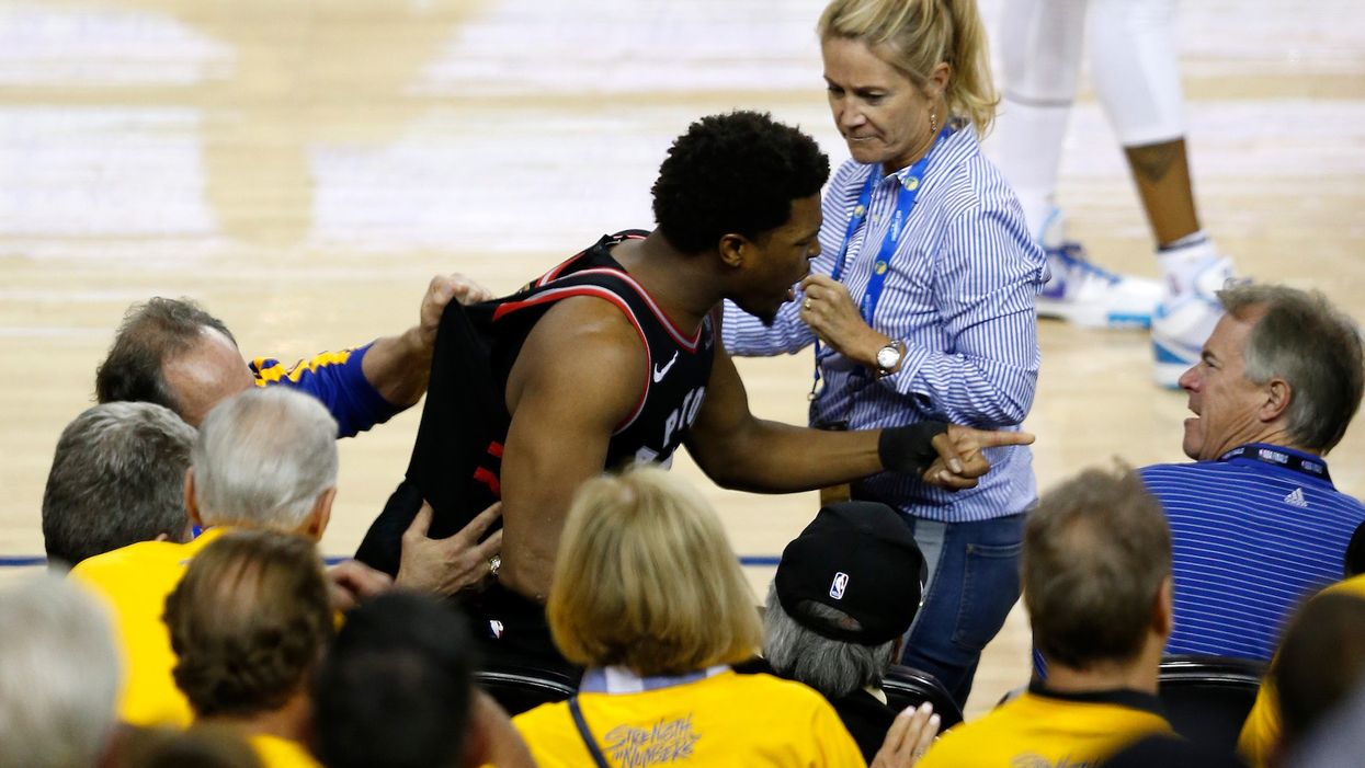 NBA part owner shoves a player during a game, gets hit with massive fine and ban