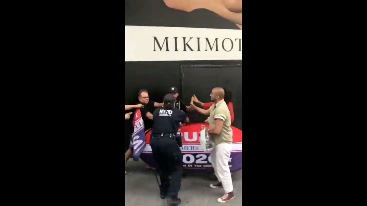 Trans actress is caught in viral video fighting a Trump supporter who was only posing with a Trump sign. He responds with kindness.
