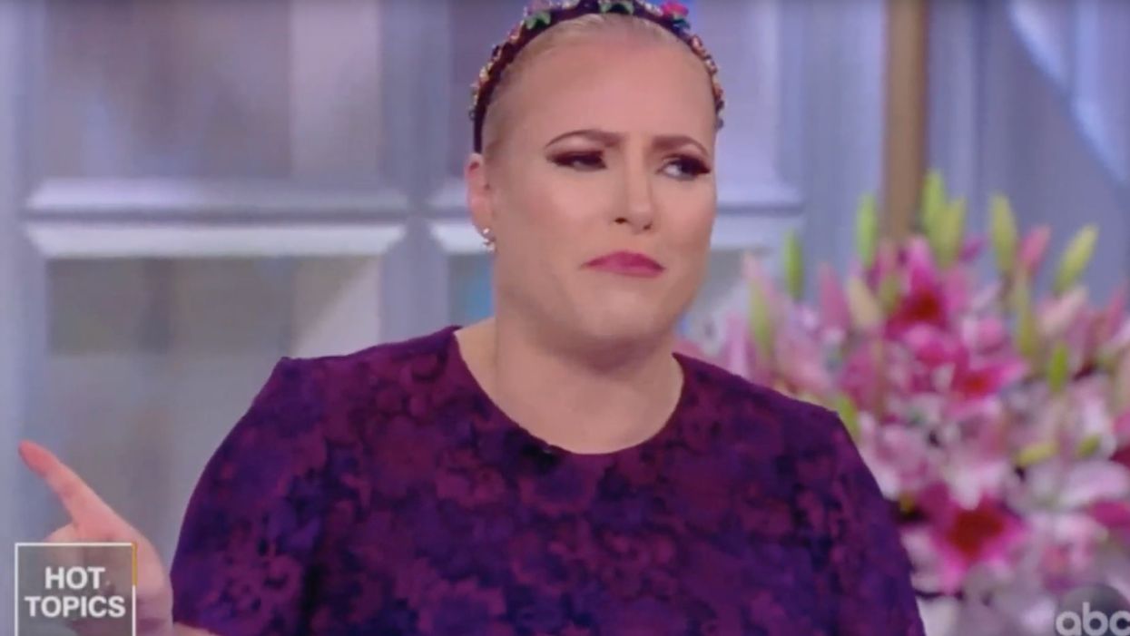 Meghan McCain hauls off and calls 'The View' co-host Joy Behar a 'b****' during heated exchange over Trump campaign
