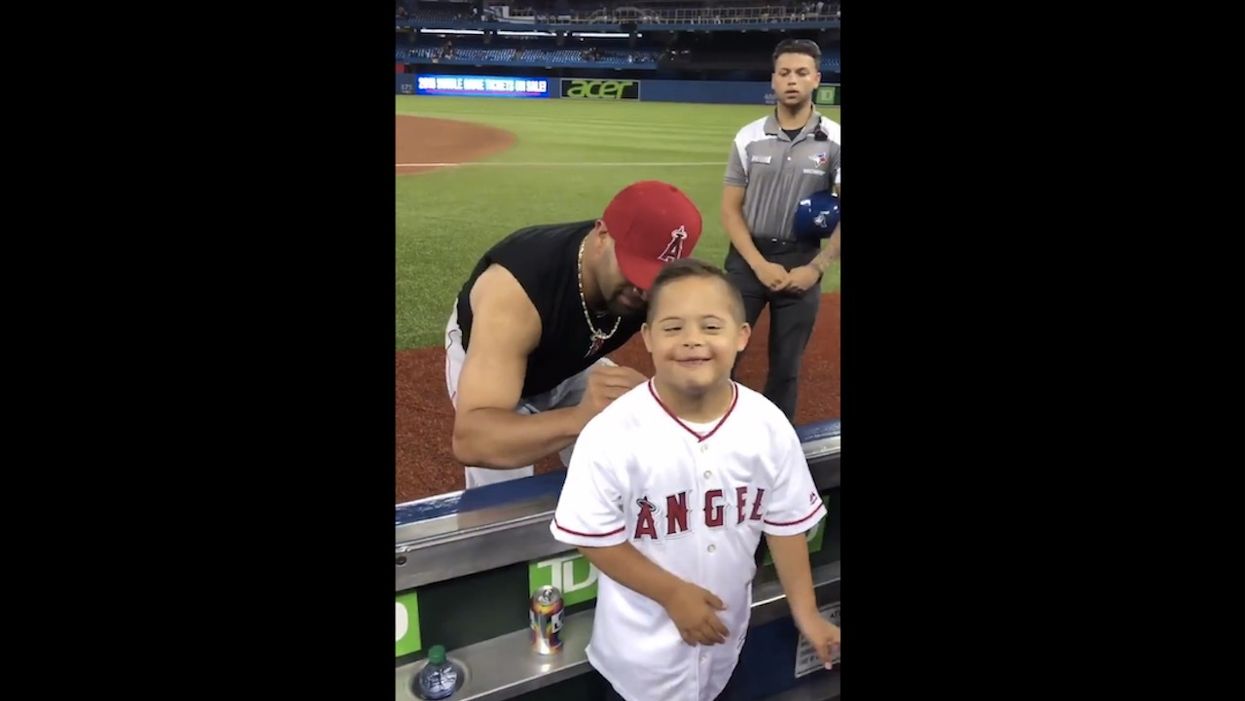 Baseball star Albert Pujols is famous for racking up home runs. But he's also become a champion for people with Down syndrome.