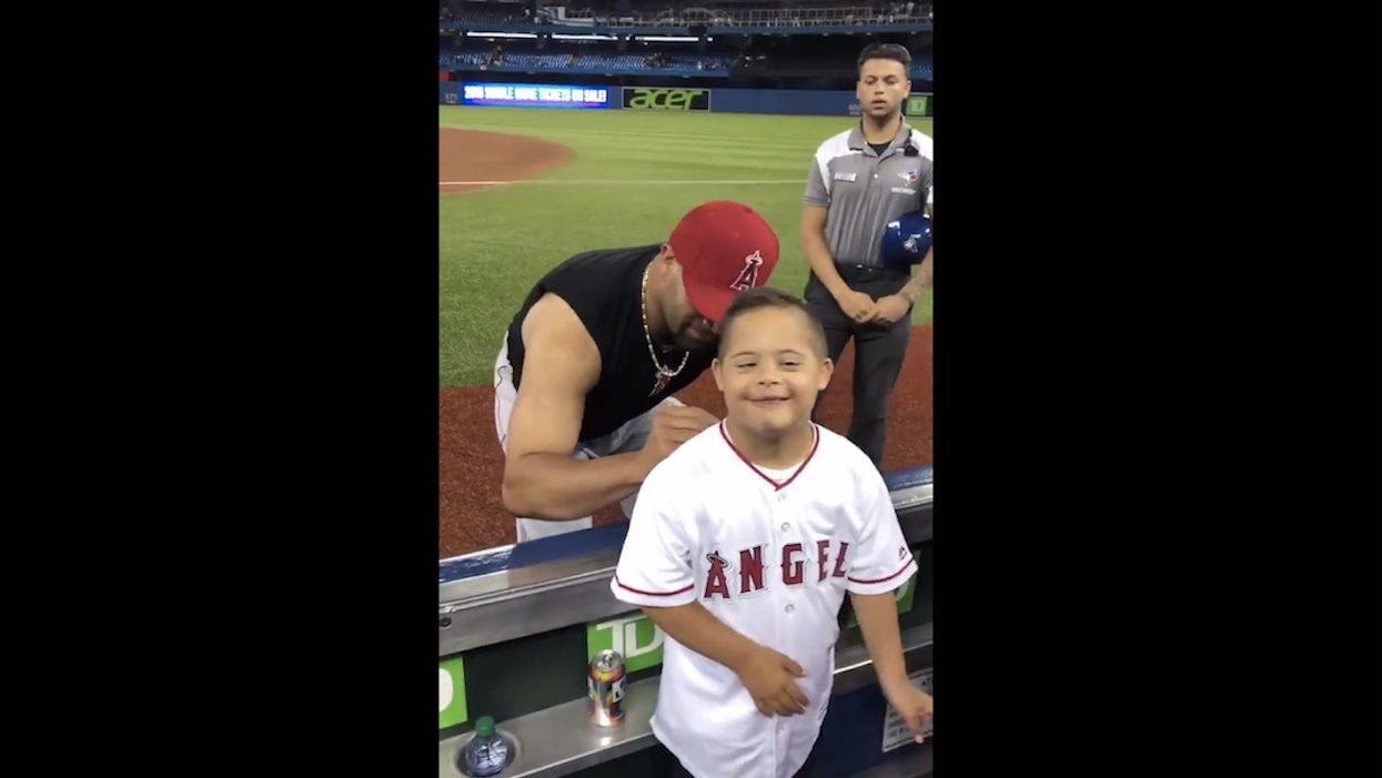 Baseball star Albert Pujols is famous for racking up home runs. But he's also become a champion for people with Down syndrome.