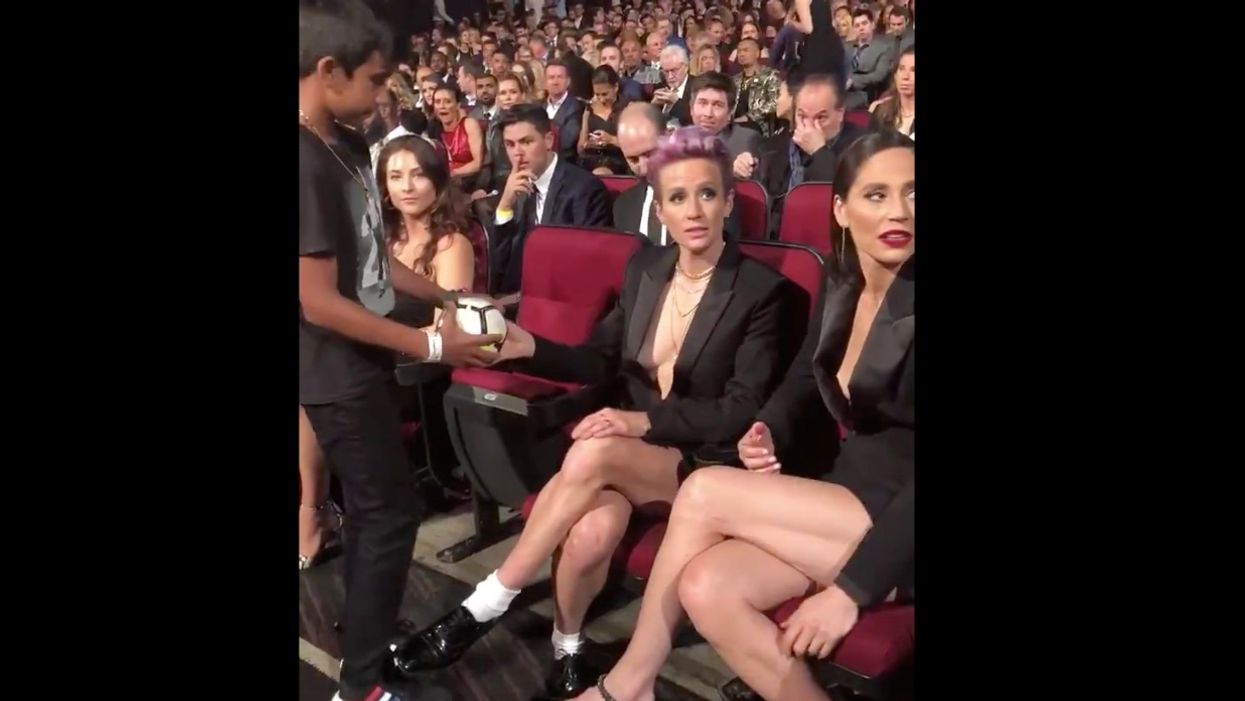 Megan Rapinoe faces heavy criticism for appearing to snub a young fan who asked for her autograph