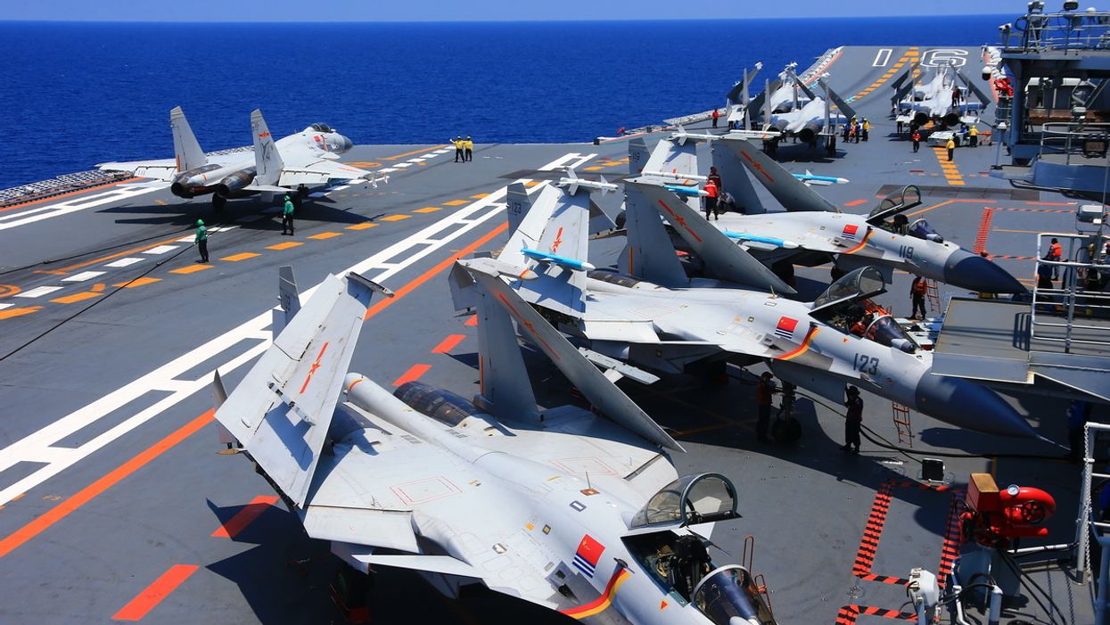 China holds military drills near Taiwan, threatens sanctions for US companies