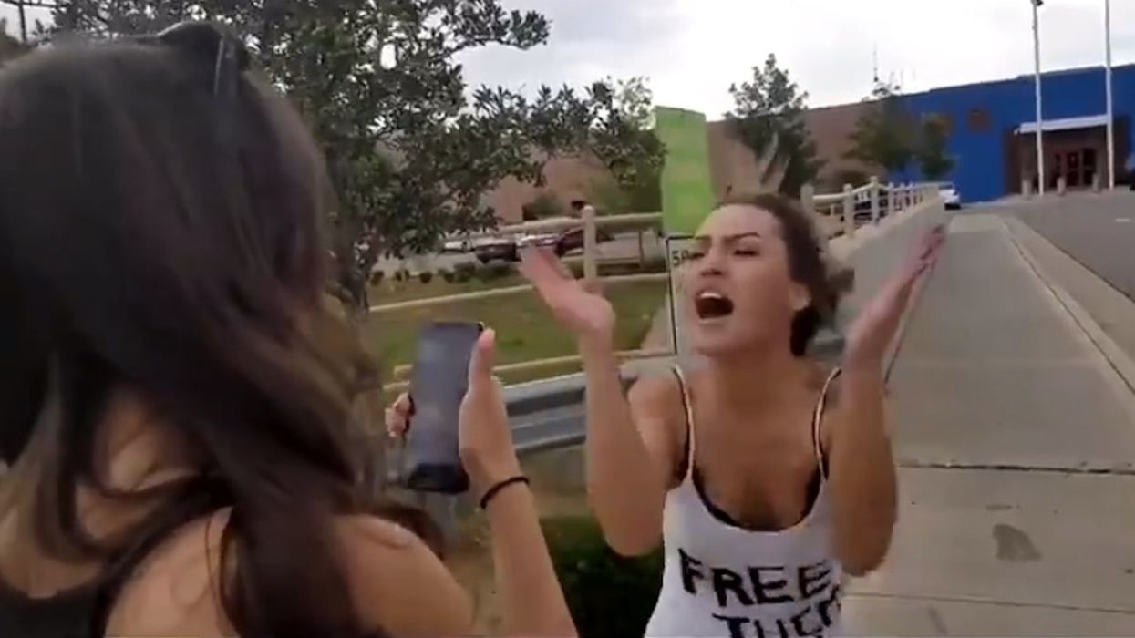 'F*** the troops!': Unhinged leftist goes on potty-mouthed tirade against military, American flag at ICE facility — um, and pole danced