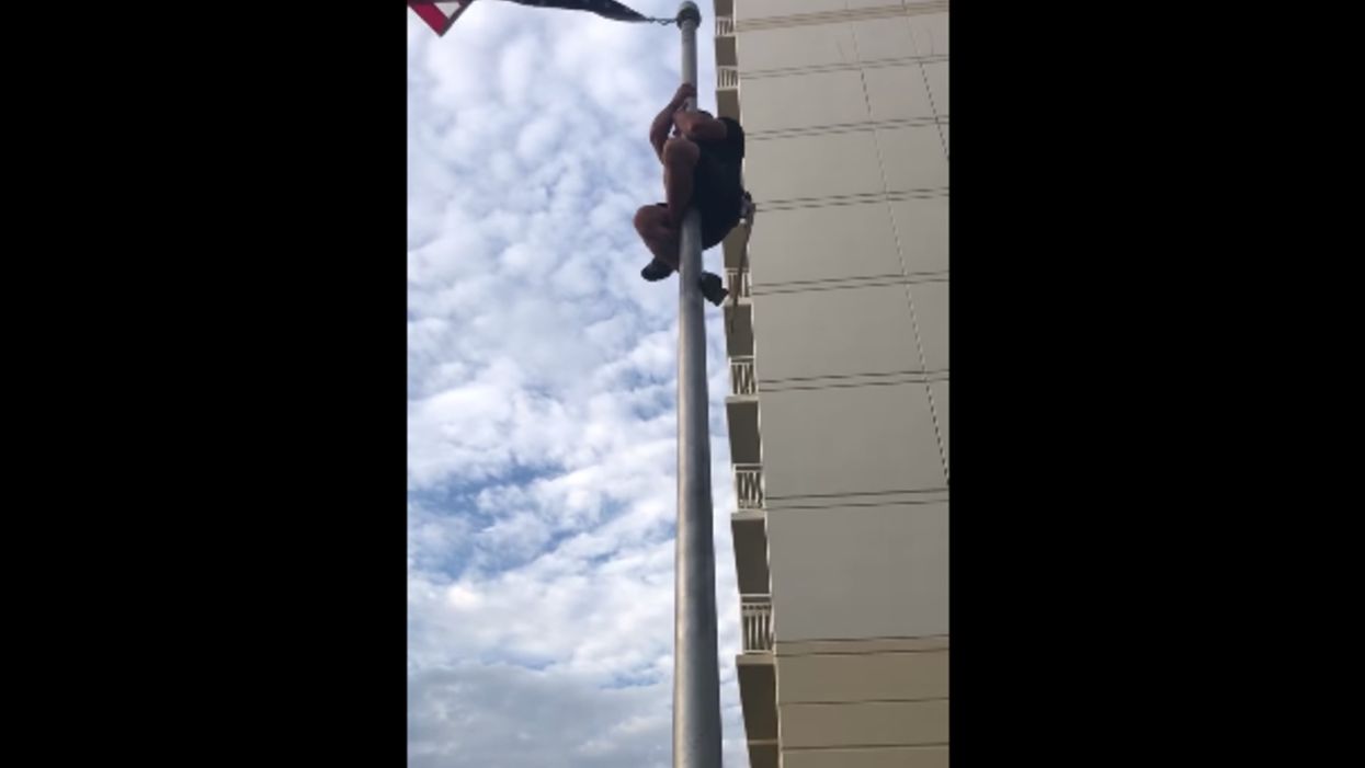 Video of former Navy SEAL climbing a flagpole to fix US flag goes viral — and he closes with a Bible verse