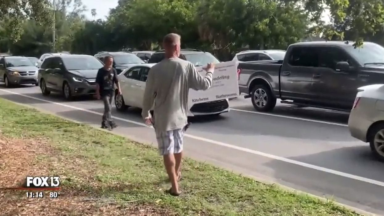 After panhandler refused man's offer of money for work, the man returned with his own sign: 'I offered him $15 an hour to do yard work'