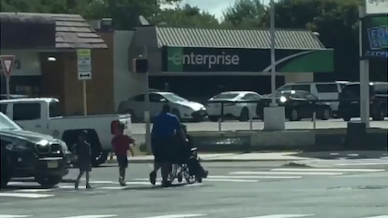 WATCH: Bus driver praised for leaving his seat, escorting passenger in wheelchair and two young boys across busy intersection