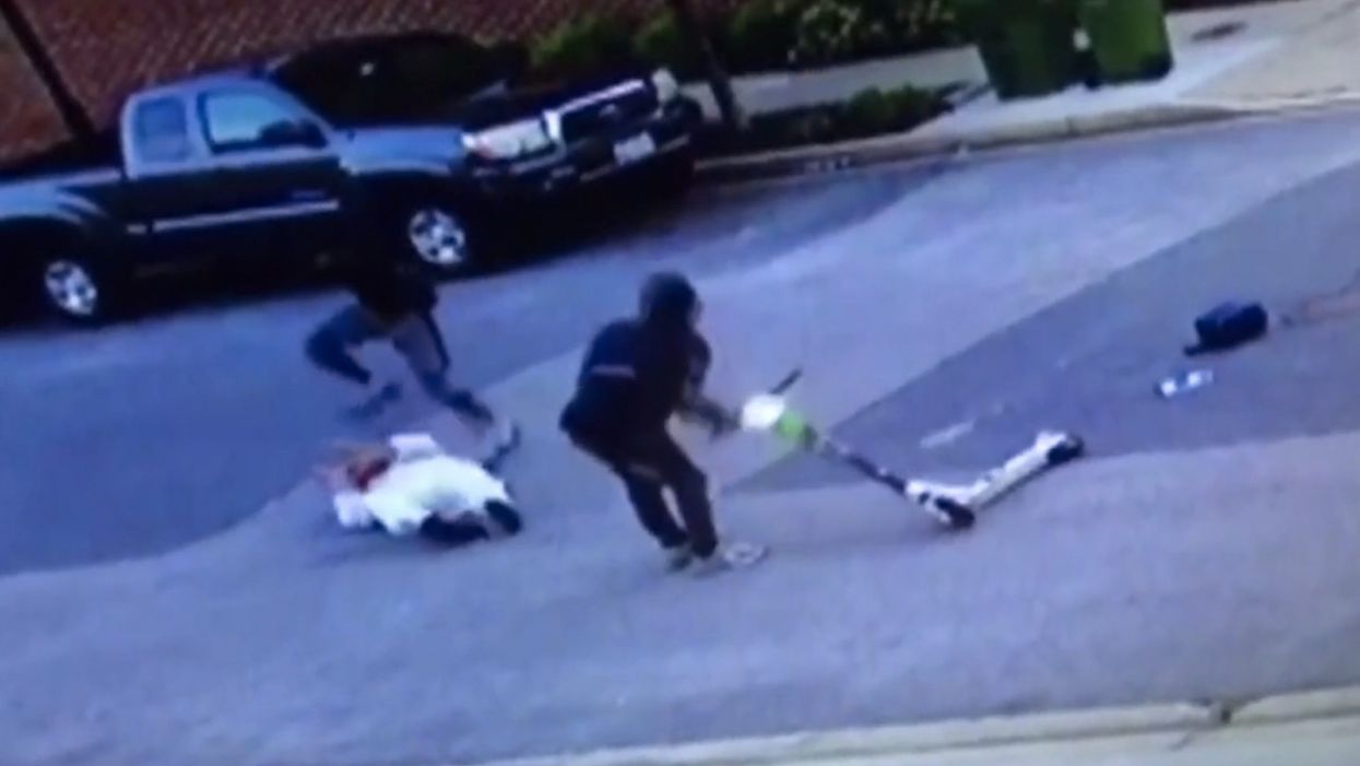 WATCH: Baltimore police dept. employee brutally beaten, robbed in street — and police commissioner says it's 'extremely shocking'