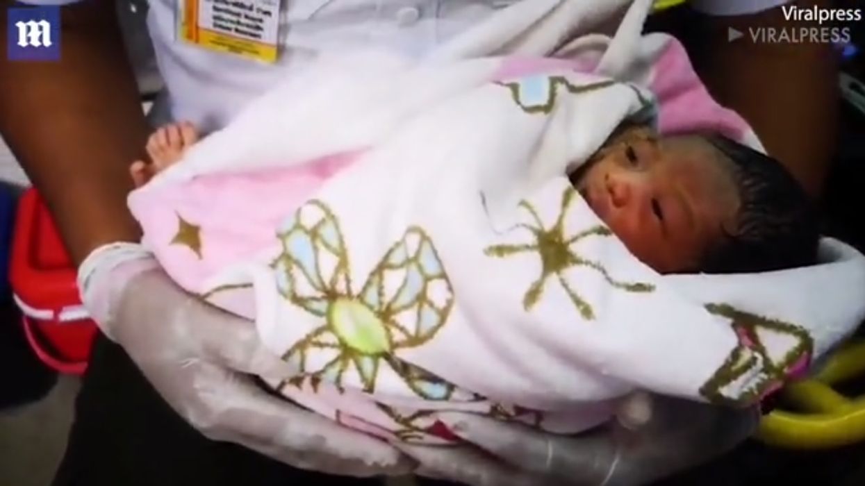 Newborn baby saved after being discarded in a plastic bag in Thailand