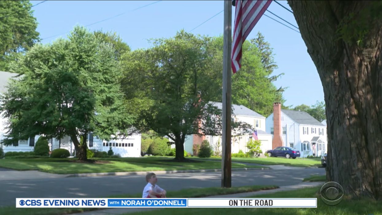 A Connecticut boy with Down syndrome and autism loves the American flag, so his neighbor went out of his way to make sure he could enjoy it every day