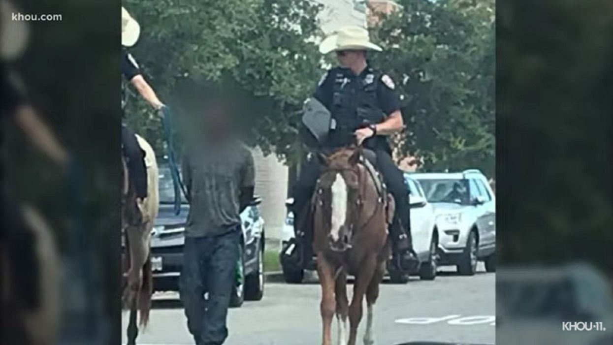 Galveston police chief apologizes after white officers on horseback led black suspect by rope