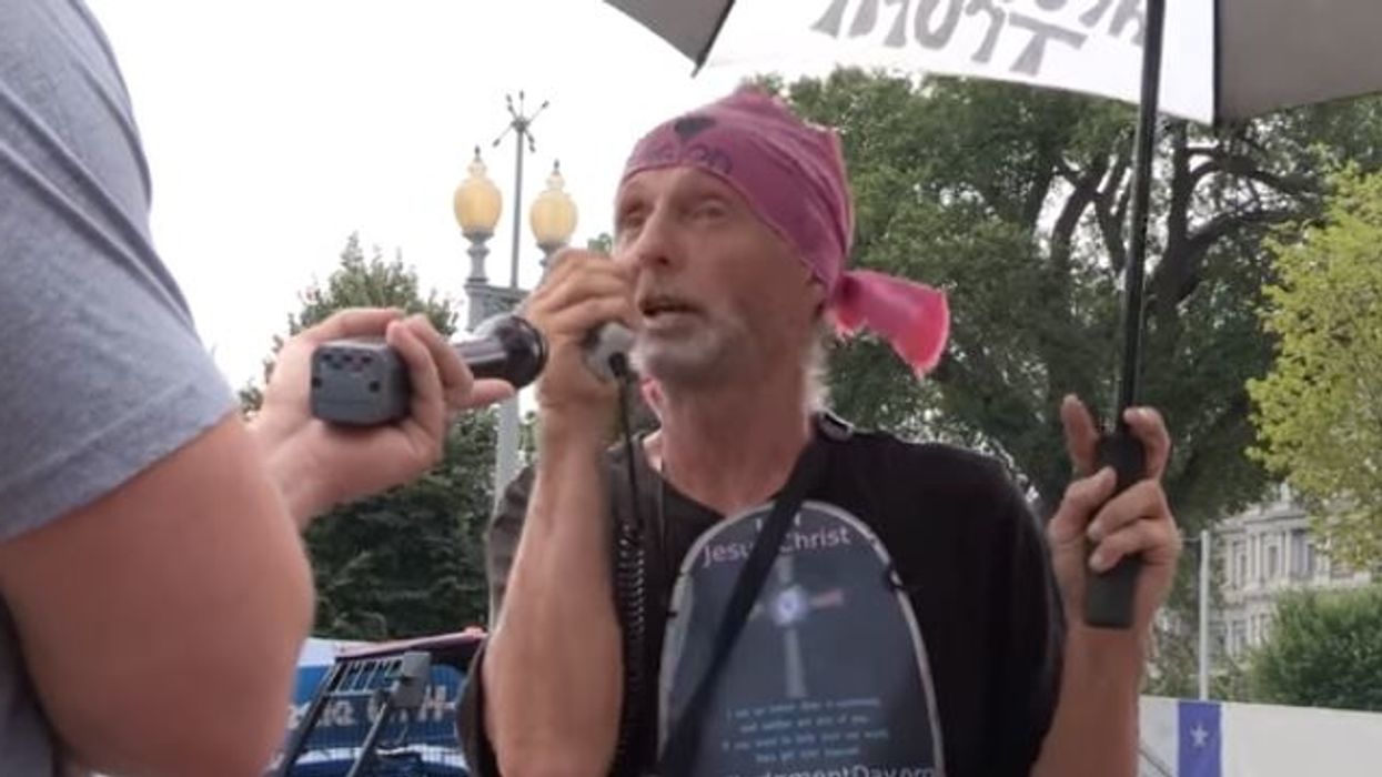 Crazy anti-Trump protester claims he is 'Jesus Christ' and that Trump is a racist