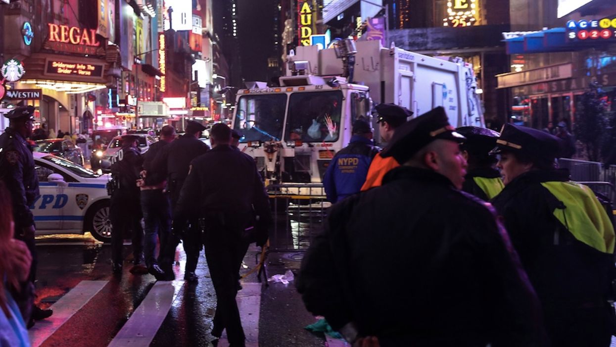 Last month, water was dumped on humiliated NYPD officers. Now concrete, bottles are thrown at them.