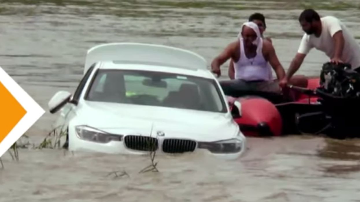 Parents bought their son a BMW for his birthday. According to reports, he wanted a Jaguar instead, so he pushed the BMW into a nearby river.