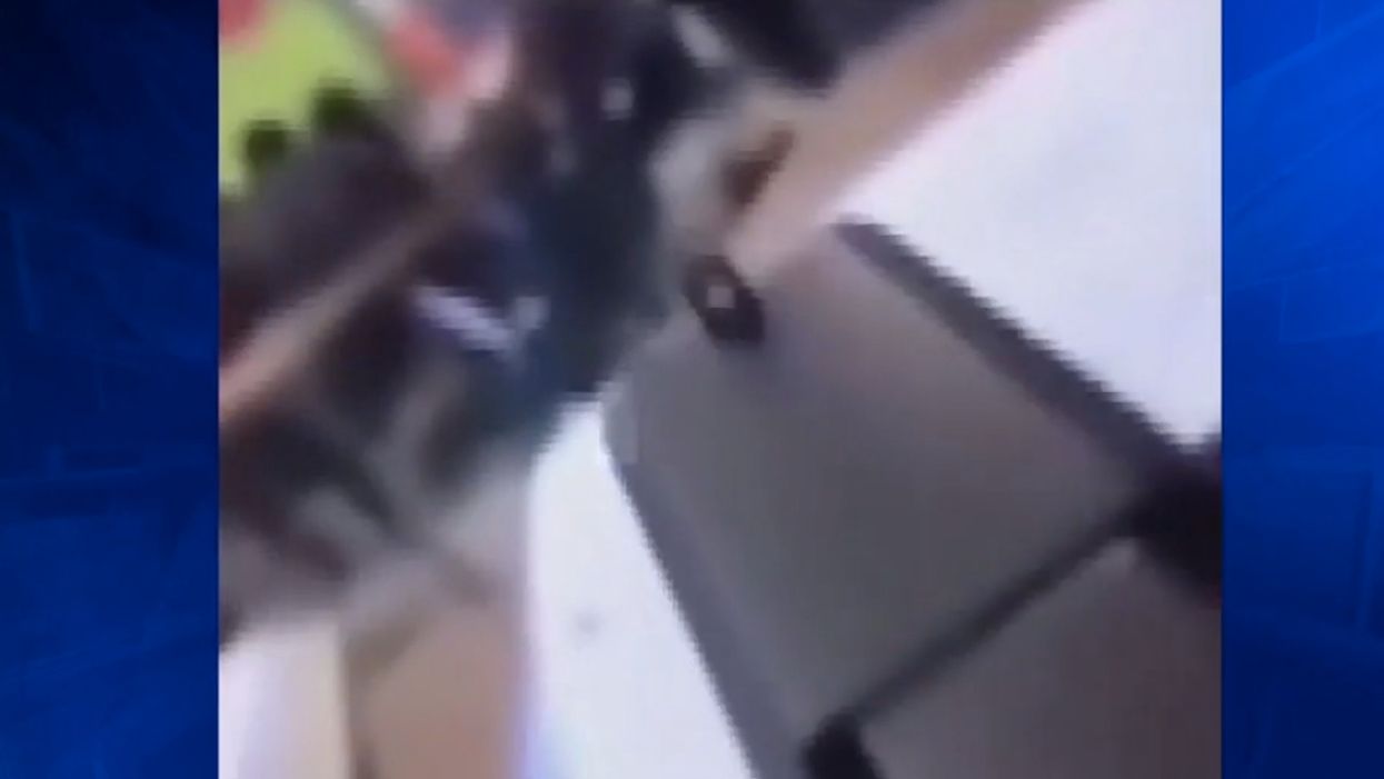 Teen arrested over video of gun pointed at students in classroom