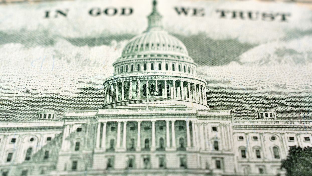 Federal government report says US deficit to grow by $800 billion more than previously expected over next decade, predicts $1 trillion shortfall next year alone