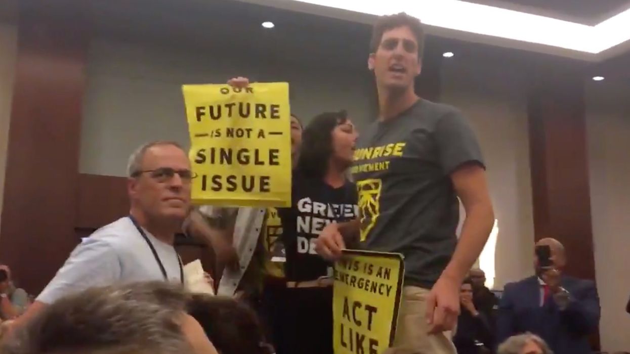 Progressive activists are furious over DNC vote on climate change debate