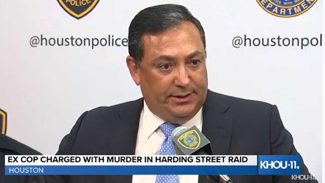 Ex-Houston cop charged with murder, accused of lying to obtain warrant for deadly raid