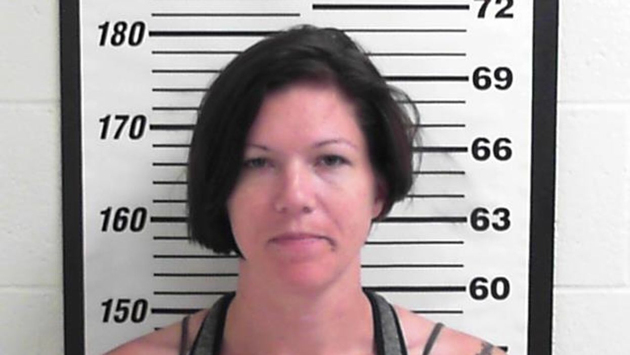 Laughing, burping woman calls police on drunk driver — while driving drunk