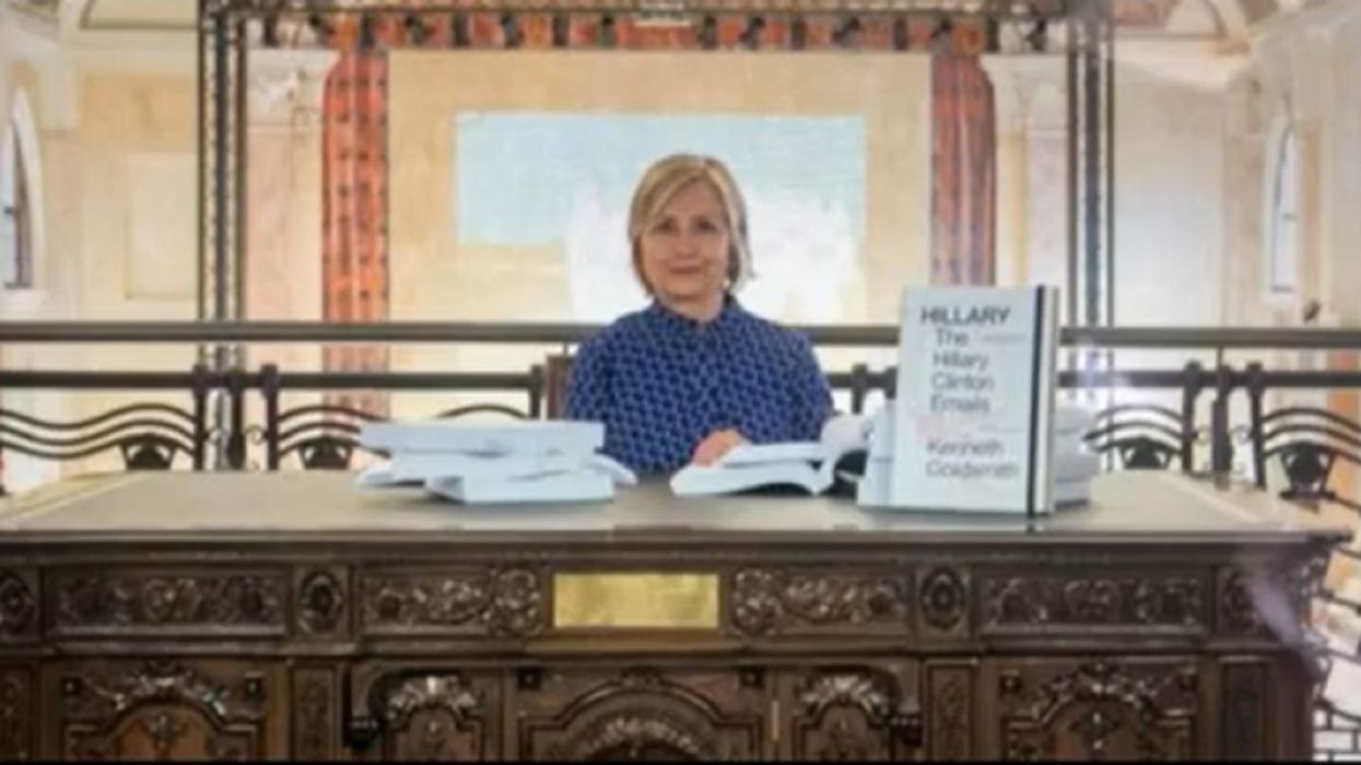 Hillary Clinton's emails are on display at an art exhibit in Venice. She spent an hour flipping through them herself.