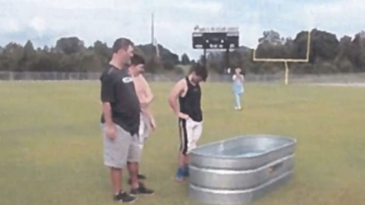 Atheist group cries foul after student-athletes baptized on HS football field. But school district is fighting back.