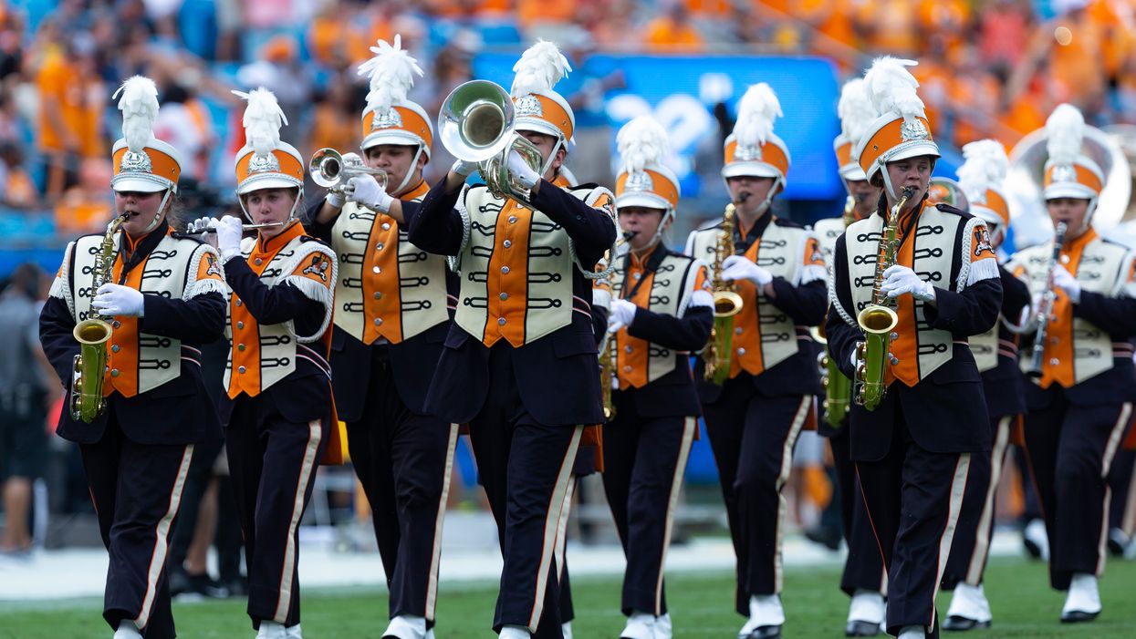 University of Tennessee marching band wears T-shirts designed by bullied 4th grader