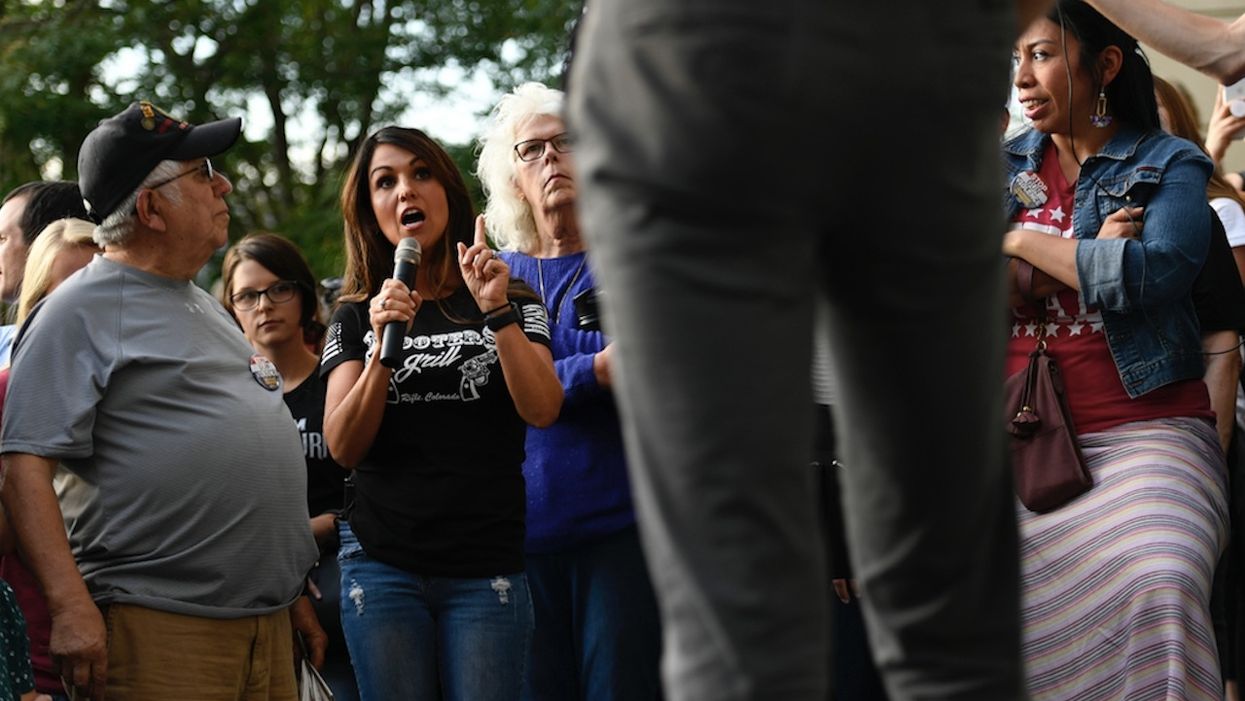 WATCH: Pro-gun woman repeatedly heckled while trying to ask Beto O'Rourke a question about his gun confiscation promise