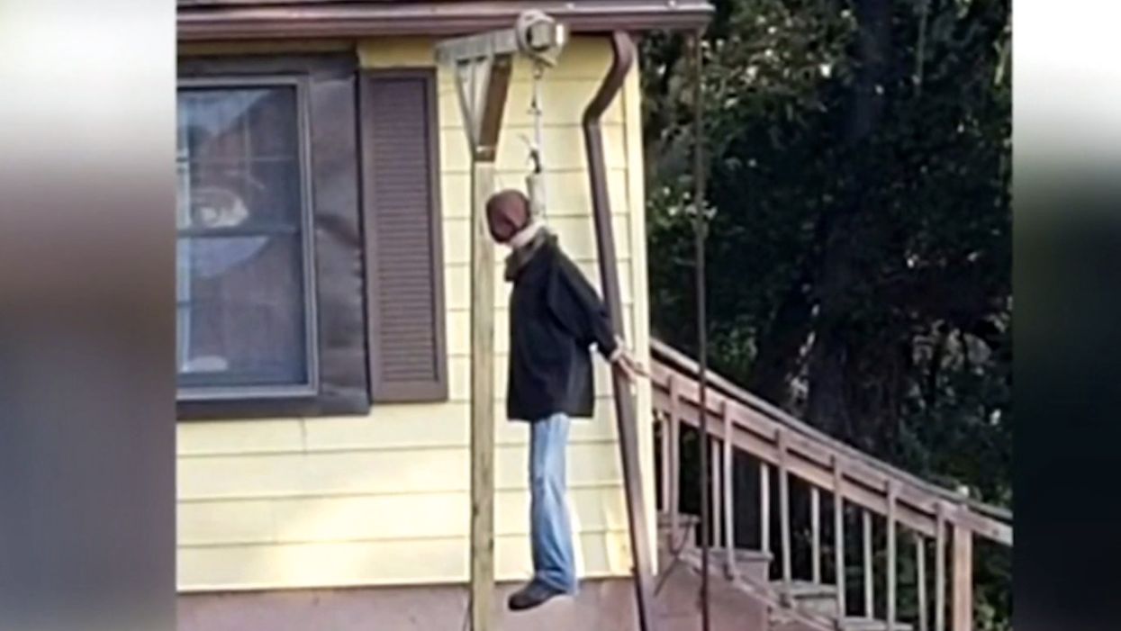 Dummy hanging from gallows in yard called 'hate crime' by local NAACP president. But homeowner says it was for Halloween.