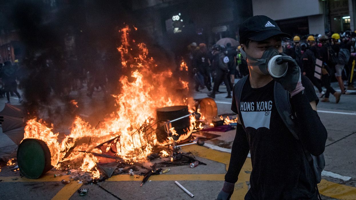 Police shoot protester in Hong Kong as tensions rise on anniversary of Communist rule in China