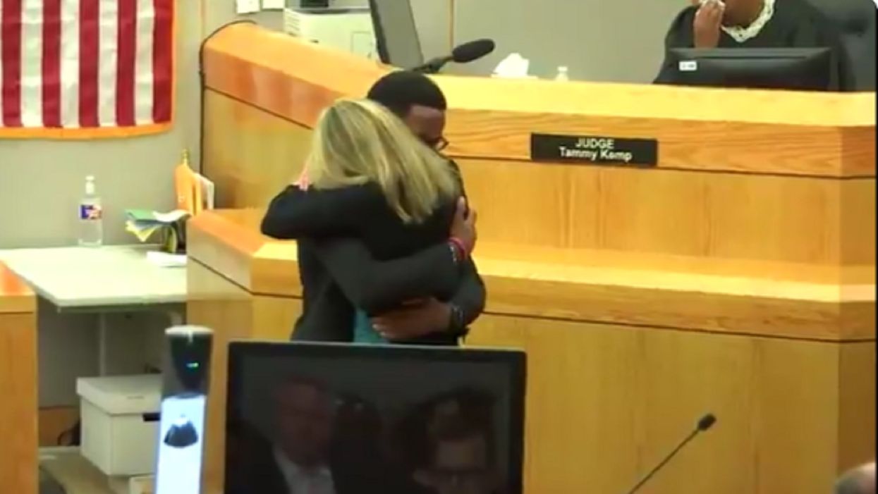 Victim Botham Jean's brother forgives convicted ex-officer for killing, embraces her at sentencing