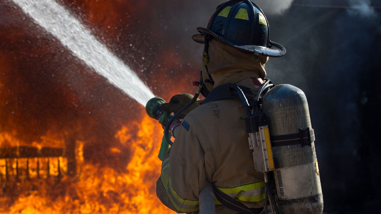 Nudists with a 55-year-old fire truck help firefighters contain a wildfire in Tennessee