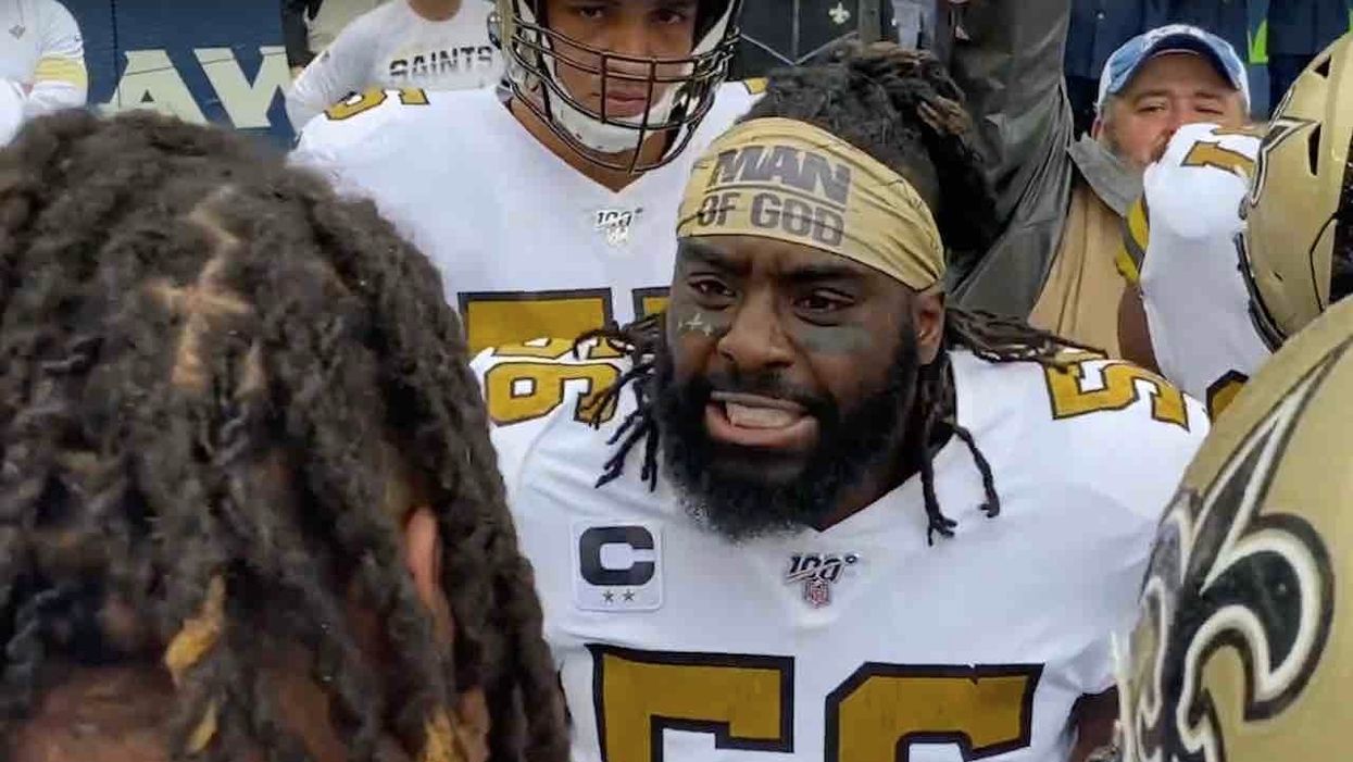 NFL player says league fined him for 'Man of God' headband, asks Instagram followers if he should keep wearing it.