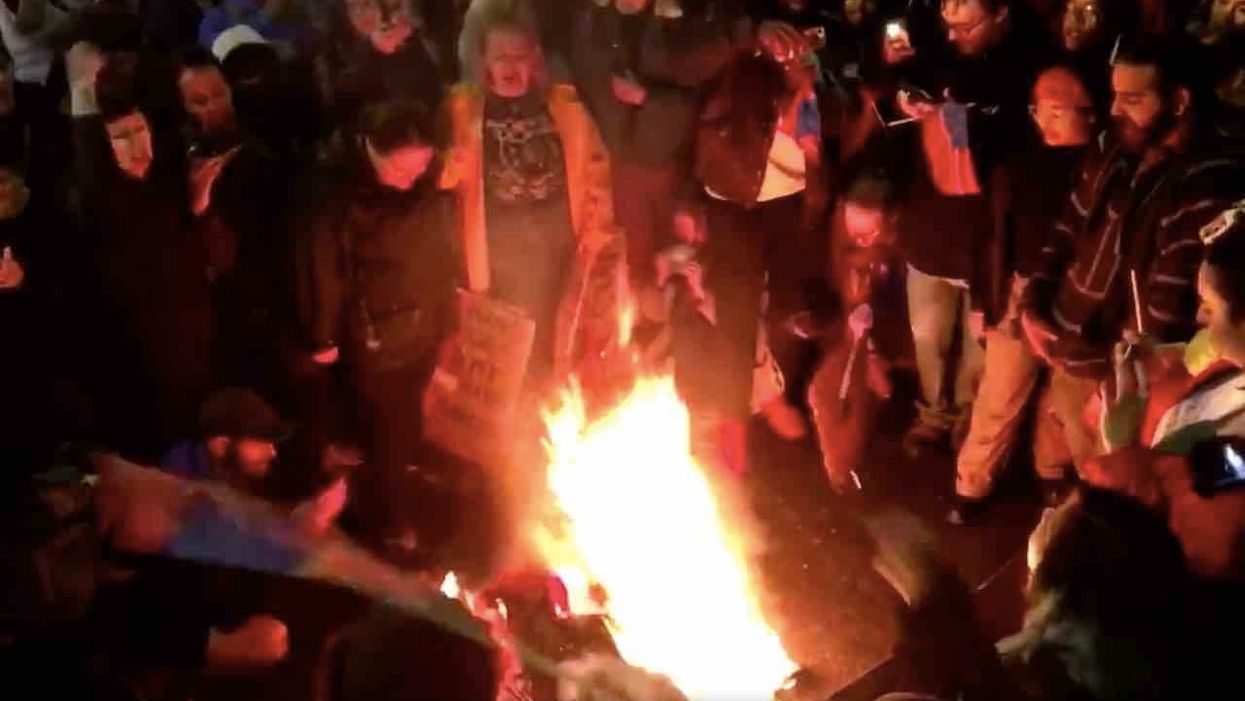Protesters outside President Trump's Minneapolis rally throw urine, burn MAGA hats, attack Trump's 'Nazi' supporters