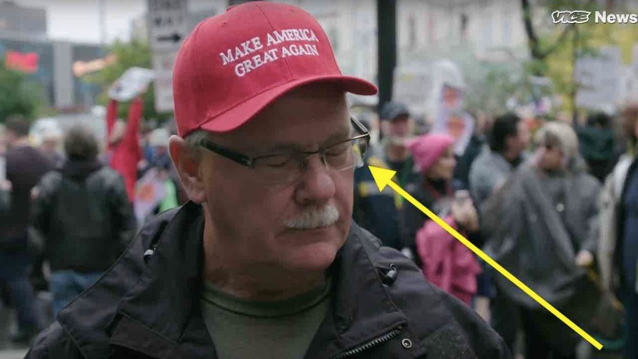 WATCH: Anti-Trump protester spits on man wearing MAGA hat outside Minneapolis rally