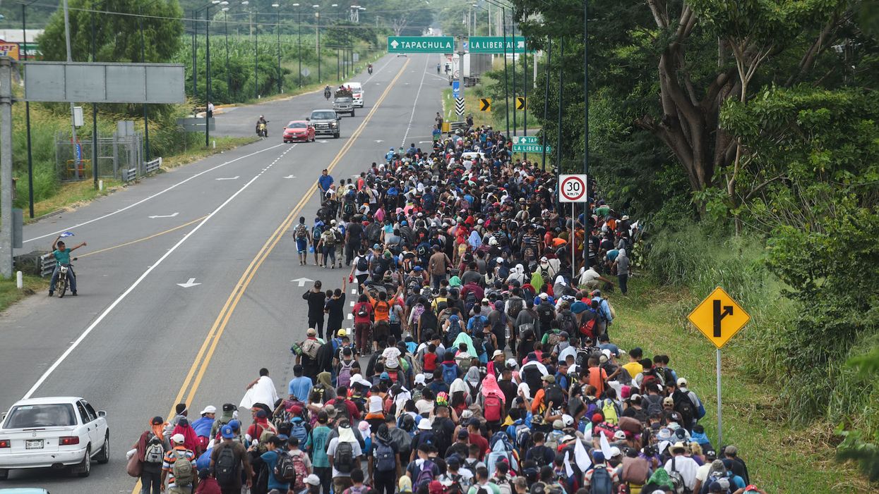 Mexican police, national guard stop caravan of 2,000 migrants heading for US