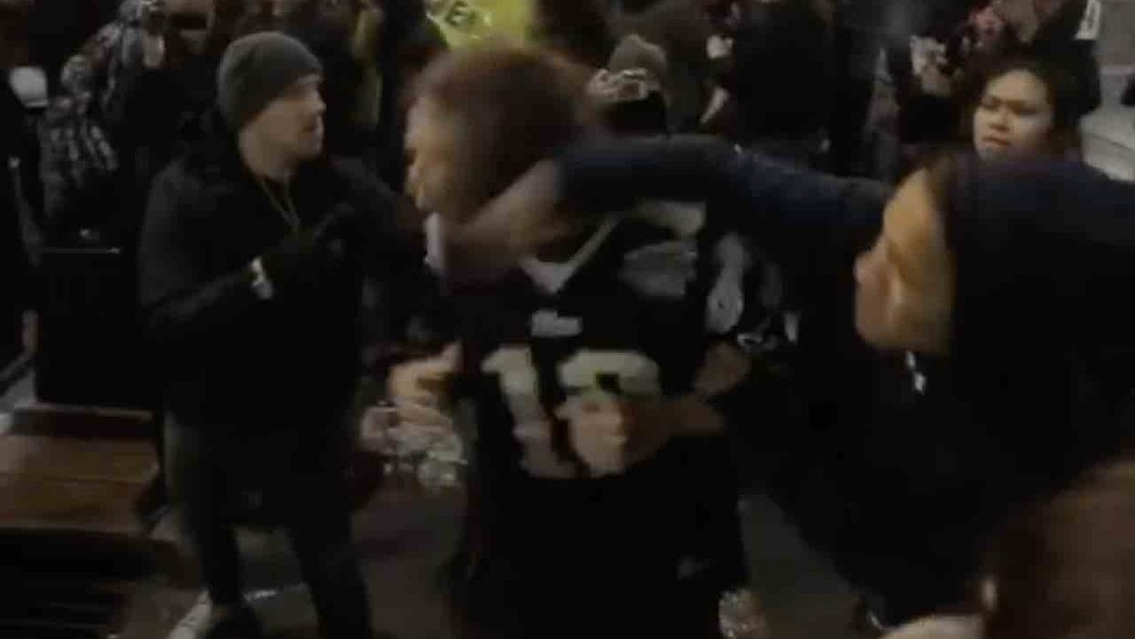 NEW VIDEO: Leftists sucker punch, put choke hold on man trying to hang on to his MAGA hat outside President Trump's Minneapolis rally