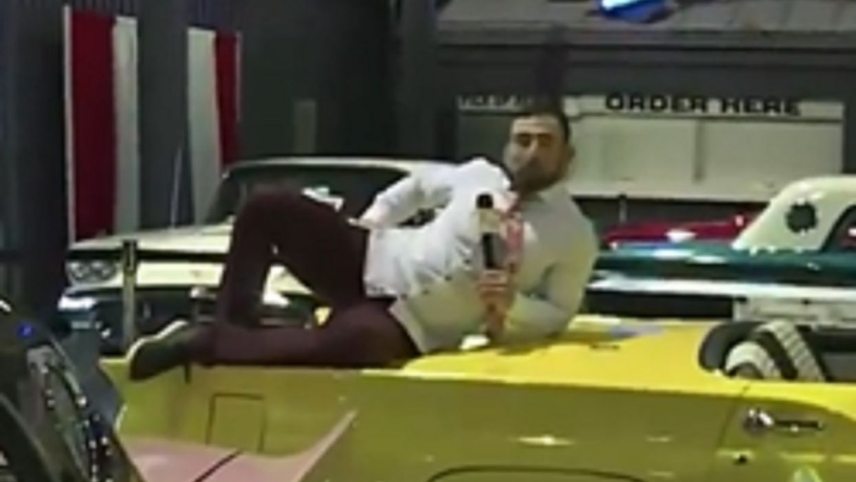 TV reporter canned after climbing on a classic car — and dooring another — during live broadcast