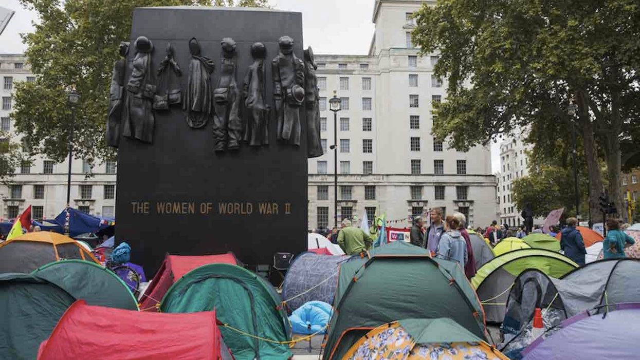 Judge tells unemployed Extinction Rebellion protester — a volunteer tree planter — to get a job to pay for vandalizing war memorial
