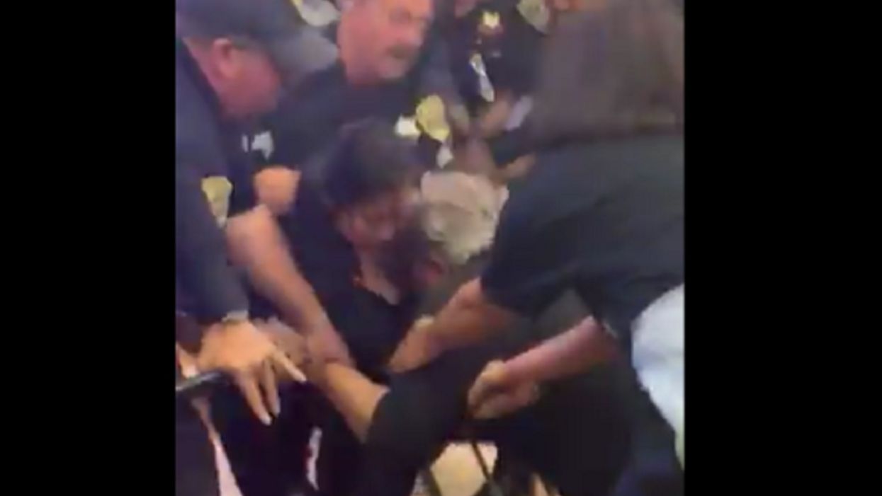 Watch: Mob of parents and teachers charge barrier at Oakland school board meeting, clashing with police